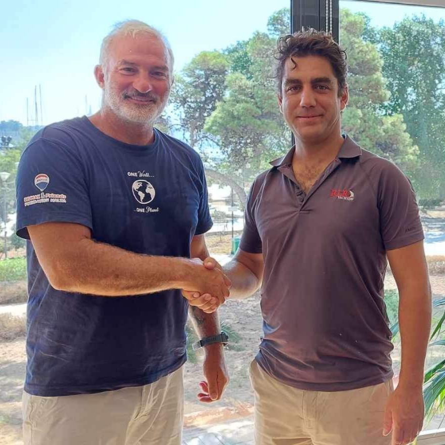 Thomas Ripard from RLR Yachting and Mark Pace Galea from Coast is Clear shake hands as we announce RLR's title sponsorship of the environmental NGO