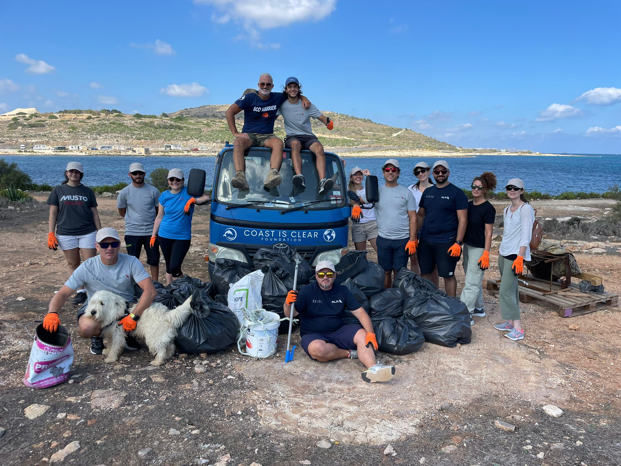 RLR Yachting team with Coast is Clear environmental NGO after our beach clean up at Baħar iċ-Ċagħaq