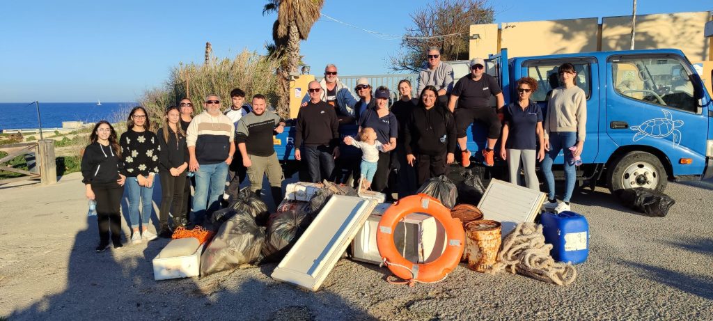 The RLR Yachting team with JRS Shipping staff after the beach clean up with Coast is Clear